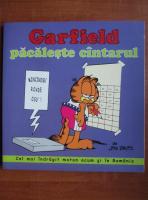 Jim Davis - Garfield pacaleste cantarul (benzi desenate)